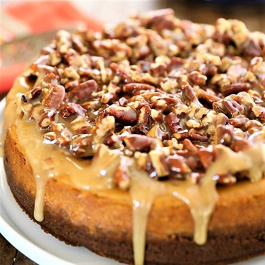 Pumpkin Cheesecake with Pumpkin Spice Pecan Caramel Top